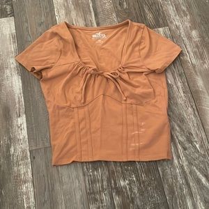 Light brown crop top with a bow